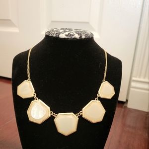 Gold cream heptagon necklace